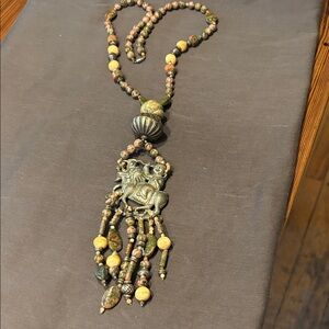 Stone and silver bead necklace.